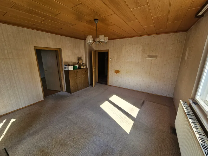 Einfamilienhaus mit Potential auf schönem, ebenem Grundstück 