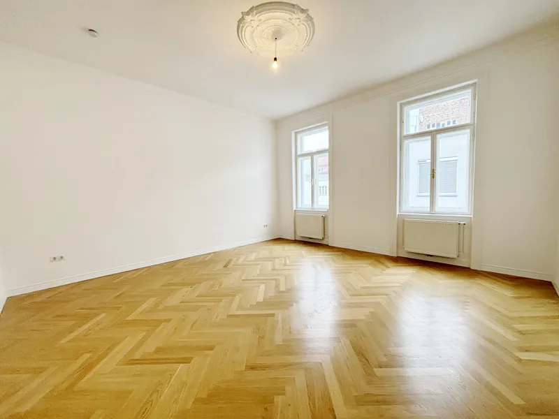 Sanierter Stilaltbau mit exklusivem Dachaubau – Wohnen über den Dächern des Dritten