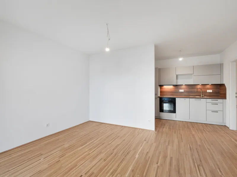 Moderne Erstbezug-Mietwohnungen mit privaten Freiflächen und Garage im 21. Bezirk