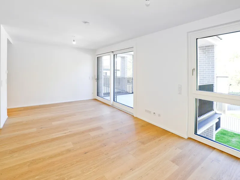 WOLKE SIEBEN: Charmante 2-Zimmer Gartenwohnung mit Terrasse