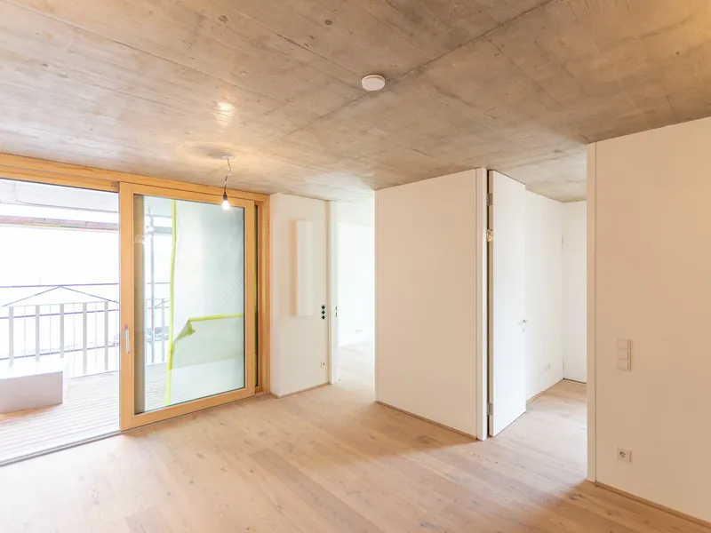 VILLAGE IM DRITTEN | Moderne 4-Zimmer Wohnung mit zwei Freiflächen