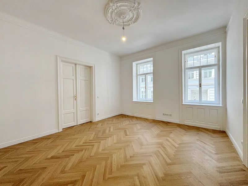 Sanierter Stilaltbau mit exklusivem Dachaubau – Wohnen über den Dächern des Dritten