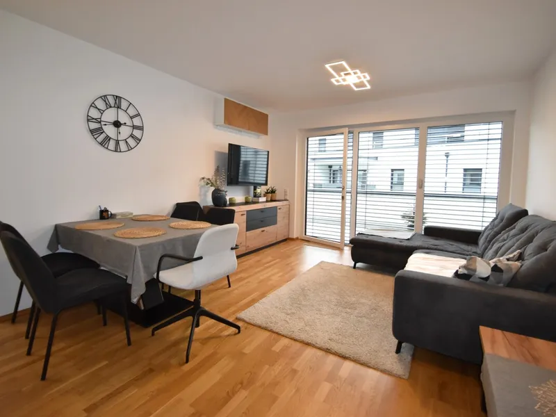 Vermietete Anlegerwohnung mit Tiefgaragenstellplatz in zentraler Grünruhelage