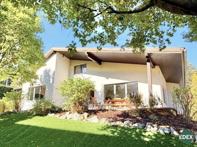 Charmantes Einfamilienhaus mit Kamin, Südterrasse und Garten in ruhiger Wohnlage