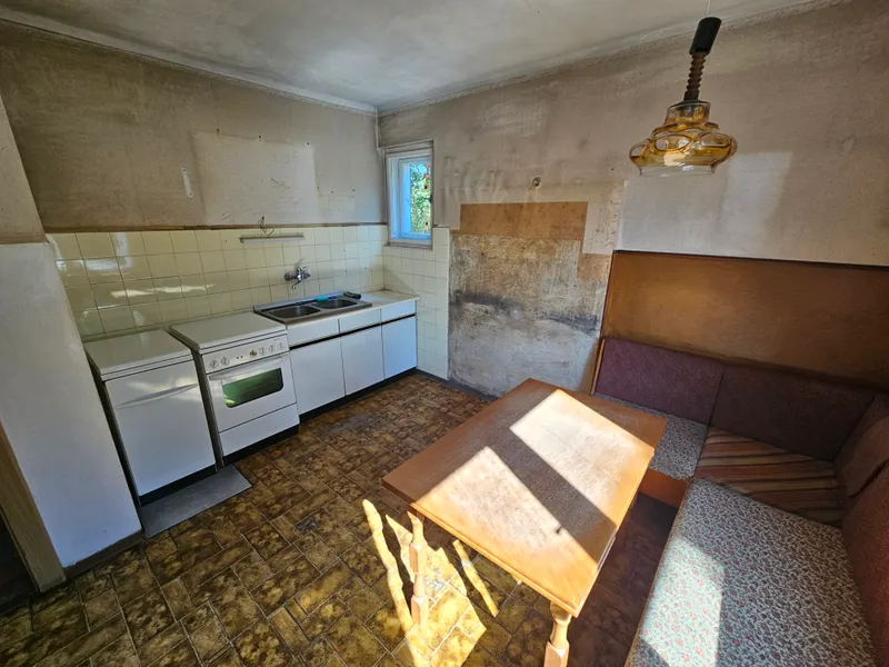 Einfamilienhaus mit Potential auf schönem, ebenem Grundstück 